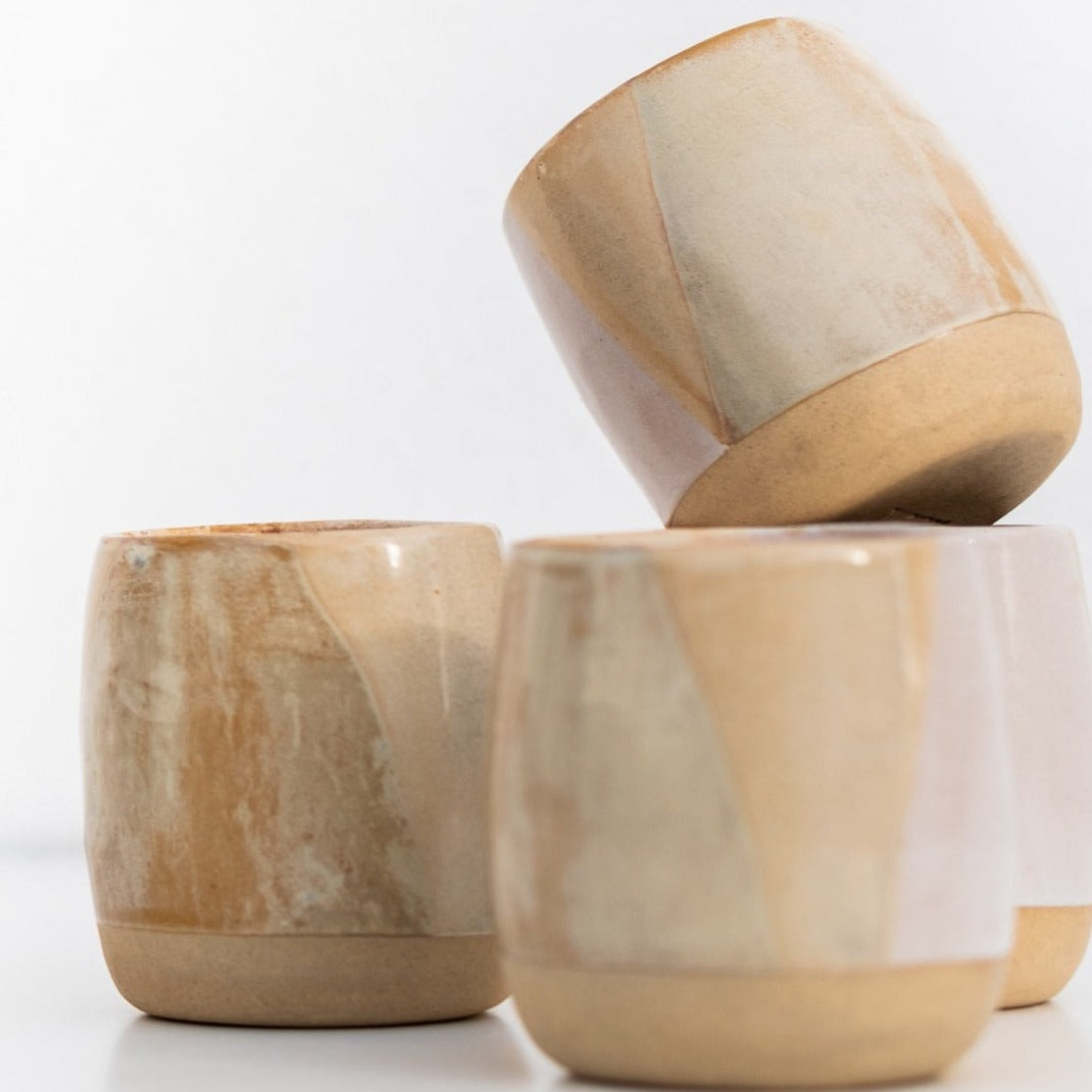 4 handmade ceramic cups dipped in two different glazes